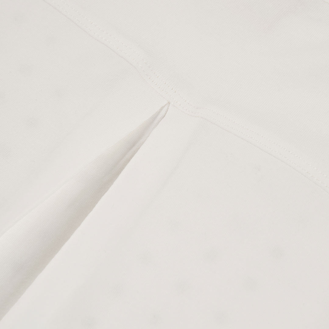 CAMISETA DE MANGA LARGA DE PUNTO ELÁSTICO BLANCA DE NIÑA