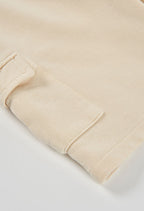 BERMUDAS DE FELPA BEIGE