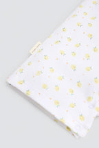 PETO SIN MANGAS DE BEBÉ BLANCO CON ESTAMPADO DE LIMONES