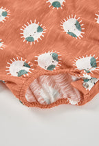 PELELE DE PUNTO CORTO CON ESTAMPADO DE SOLES
