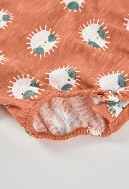 PELELE DE PUNTO CORTO CON ESTAMPADO DE SOLES