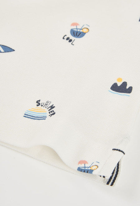 POLO PIQUÉ DE NIÑO CON ESTAMPADO PIRATA