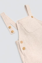 CONJUNTO DE BEBÉ CON PETO AMARILLO