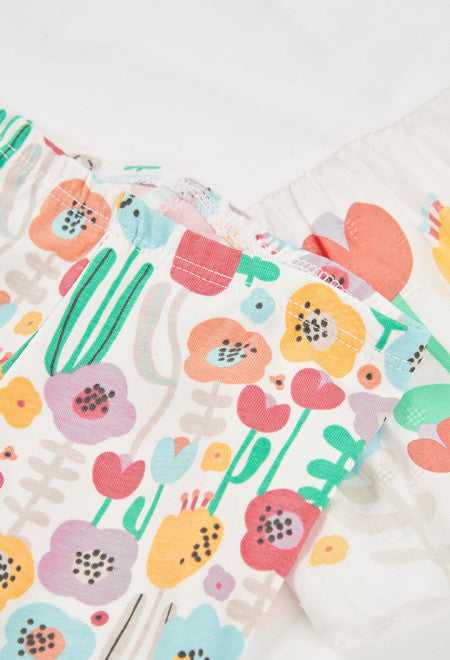 CONJUNTO DE PUNTO BLANCO CON FLORES