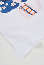 CAMISETA DE PUNTO BLANCO CON CHICA MASCANDO CHICLE