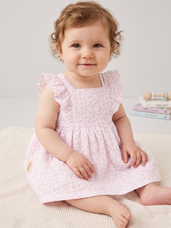 VESTIDO DE BEBÉ SIN MANGAS BLANCO CON ESTAMPADO