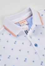 POLO PIQUÉ CON ESTAMPADO DE PALMERAS