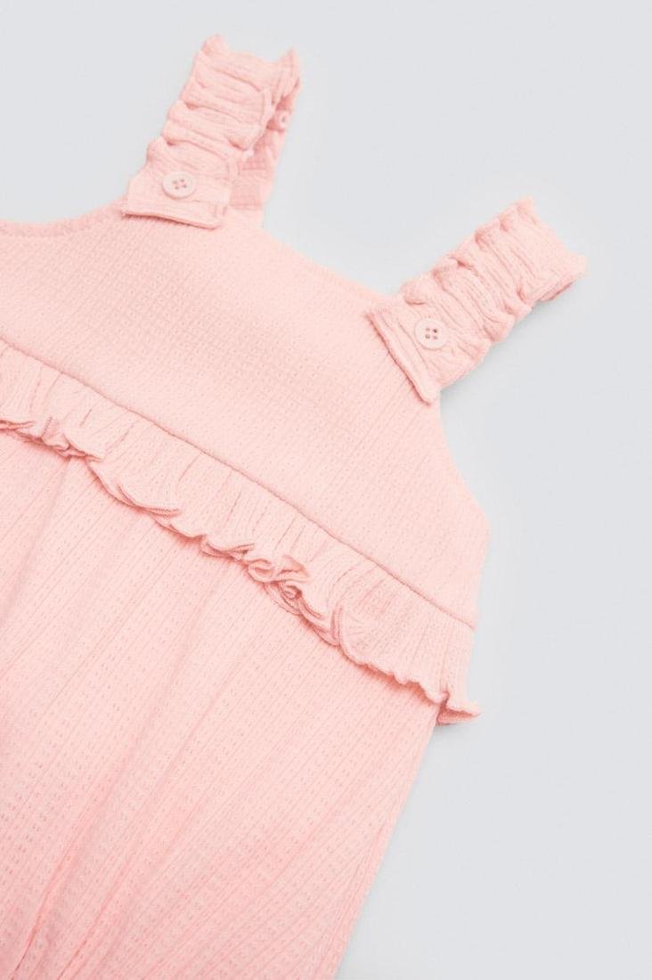 PETO DE BEBÉ ROSA DE TIRANTES